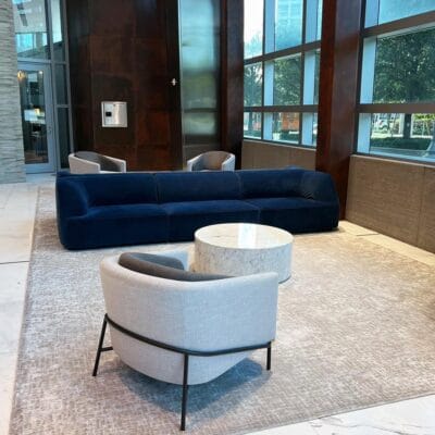 gray lobby rugs by Jamie Stern