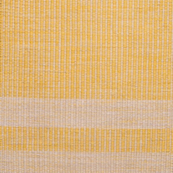 yellow hand loomed rug by Jamie Stern