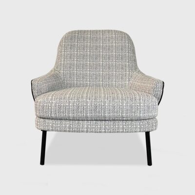 The Arya Lounge Chair's outer shell is shown upholstered in Jamie Stern On The Double in the colorway Classic Bay. 