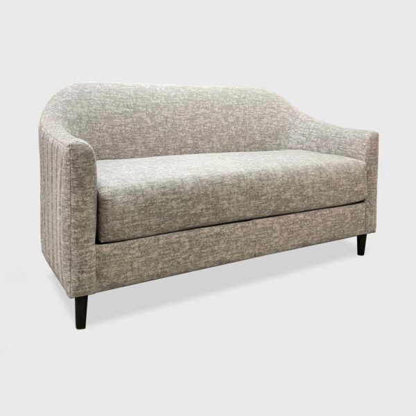 The Ashton Sofa features a tight back, reversible loose seat cushion and quilted channeling on its outback. Available in custom sizes.