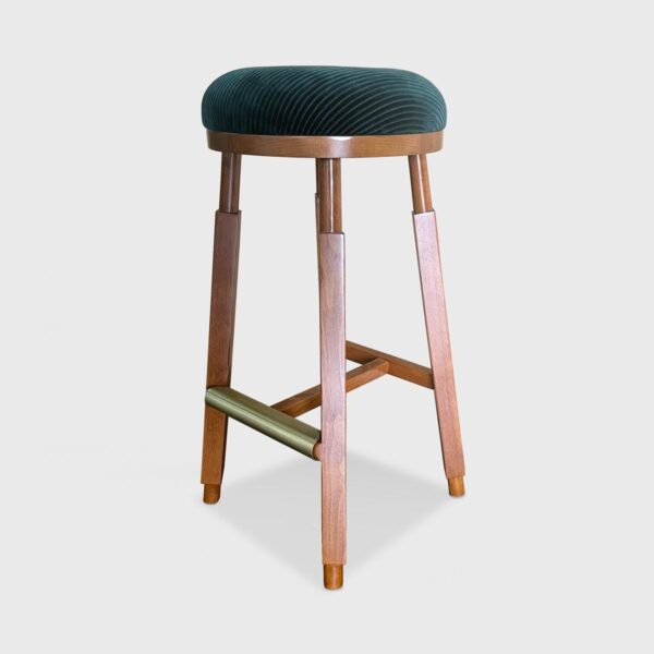 Belia Barstool from Jamie Stern features a tight seat with blind tufting, finished wood base and an "I" stretcher