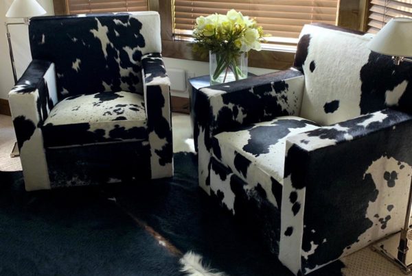 cowhide lounge chairs by Jamie Stern