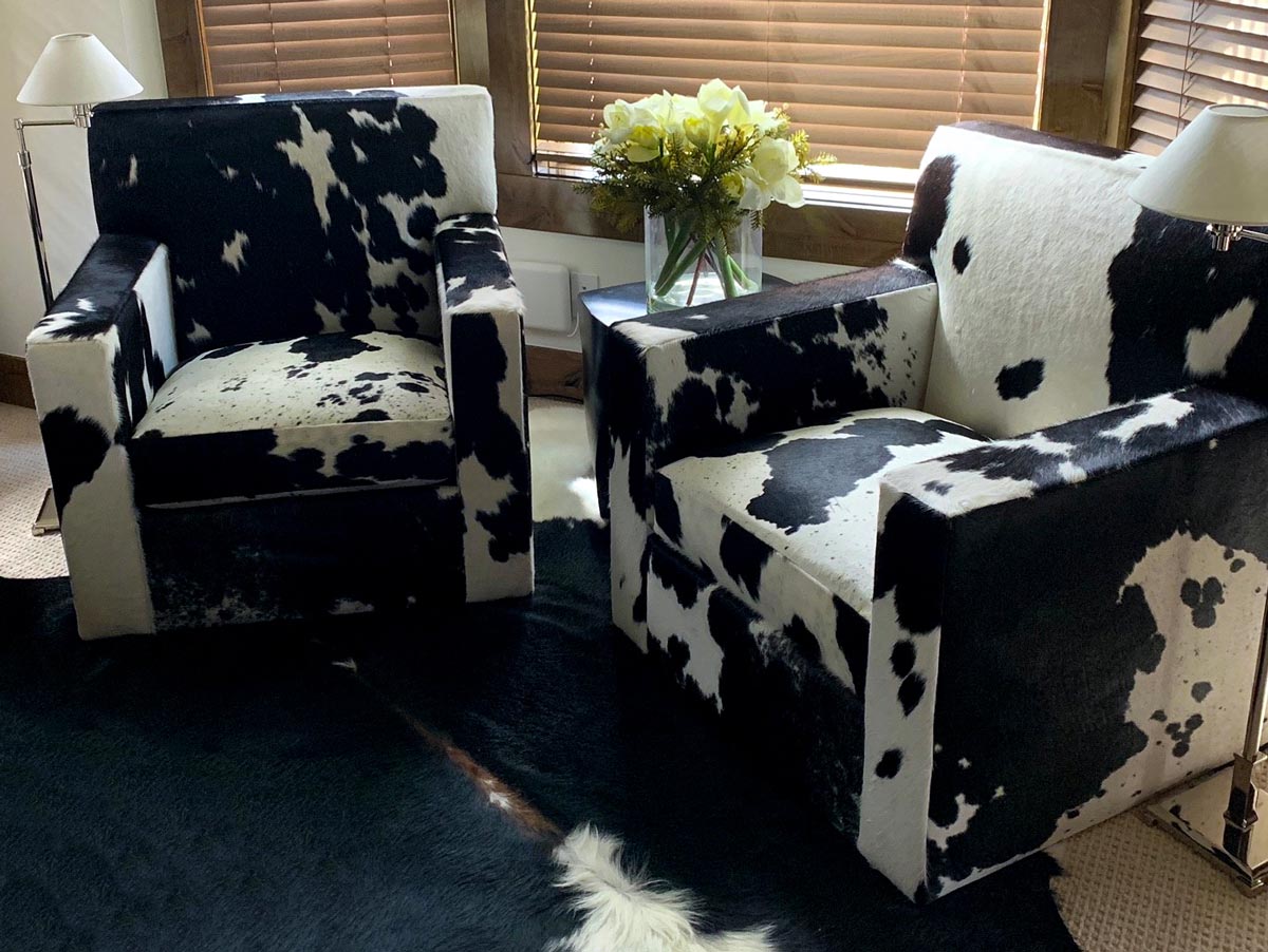 cowhide lounge chairs by Jamie Stern