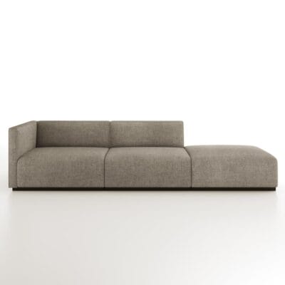 The Elias is a modular sofa featuring a tight back with welt detailing and recessed wood base