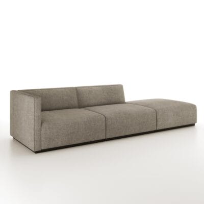 The Elias is a modular sofa featuring a tight back with welt detailing and recessed wood base