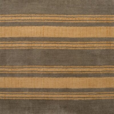 Ewald Stripe from Jamie Stern is a hand-loomed cut and loop pile area rug made of 100% New Zealand wool. It is shown here in the colorway Golden Dawn.