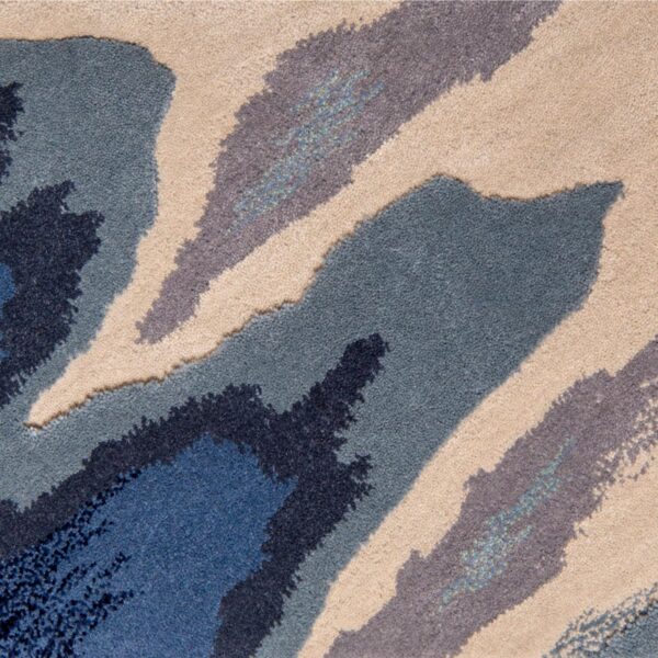 Halo from Jamie Stern is an organic multi level cut pile area rug made of 100% New Zealand wool