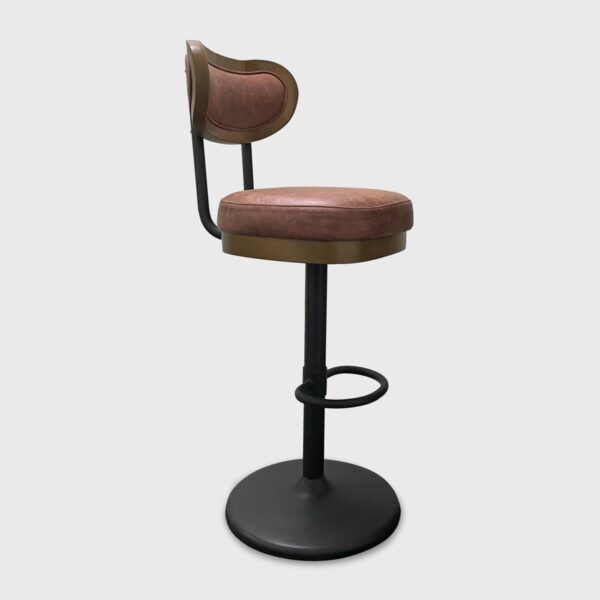 The Lennox Barstool from Jamie Stern features a finished wood frame, tight upholstered seat with a memory swivel and metal base.