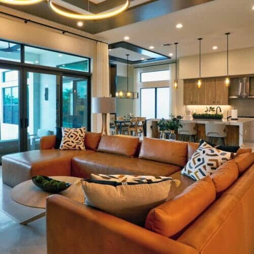 Brown leather sectional in Delray Beach living room