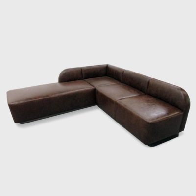 Rocco curved Sectional sofa covered in Antiquity Leather from Jamie Stern