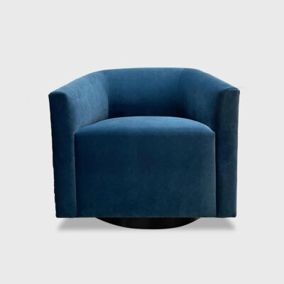 Barrel back swivel lounge chair upholstered in Jamie Stern's Viceroy Velvet in the colorway Tranquility