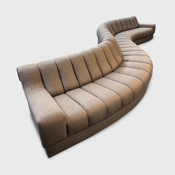 The Tacoma is a serpentine banquette from Jamie Stern