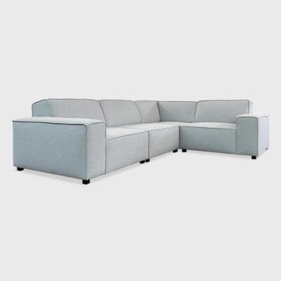 The Waylon from Jamie Stern represents contemporary sectional design with its boxy frame, tight seat and wood block feet. Available in custom sizes.