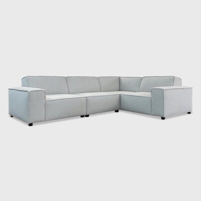 The Waylon from Jamie Stern represents contemporary sectional design with its boxy frame, tight seat and wood block feet. Available in custom sizes.
