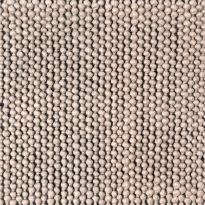 Whirley Pop is a flatweave area rug made of 100% New Zealand wool